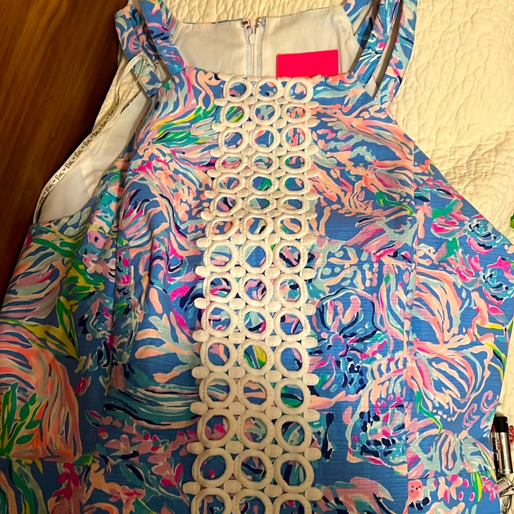 like new beautiful dress! bought from Lilly pulitzer store. only wore twice.